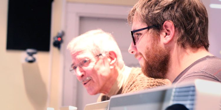 Andrew Douglass (right) is one of three fellows with Code for America who have been meeting with representatives from Charlotte citizen's groups, government agencies, non-profit organizations and corporations since early February.