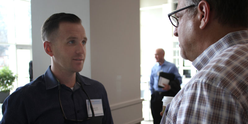 Bruce Clark, digital inclusion manager for Charlotte, with Tom Warshauer, community engagement manager for the City of Charlote, at a March 2015 meeting on digital literacy at the Knight School of Communication at Queens.